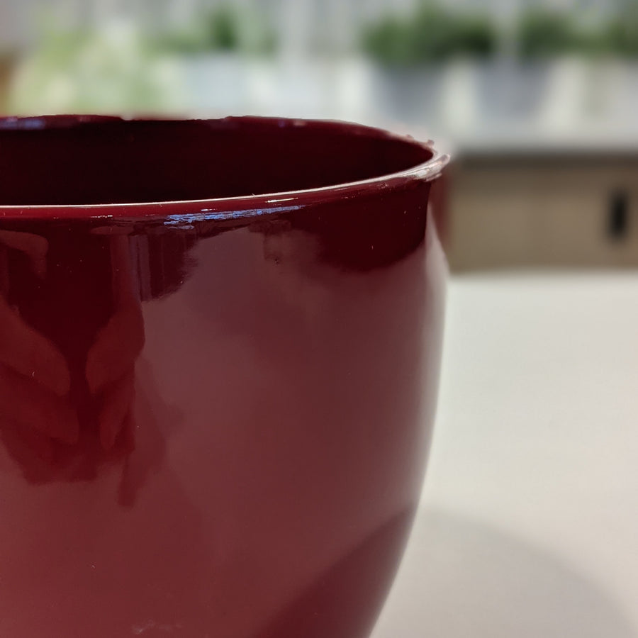 photo of red glazed pot